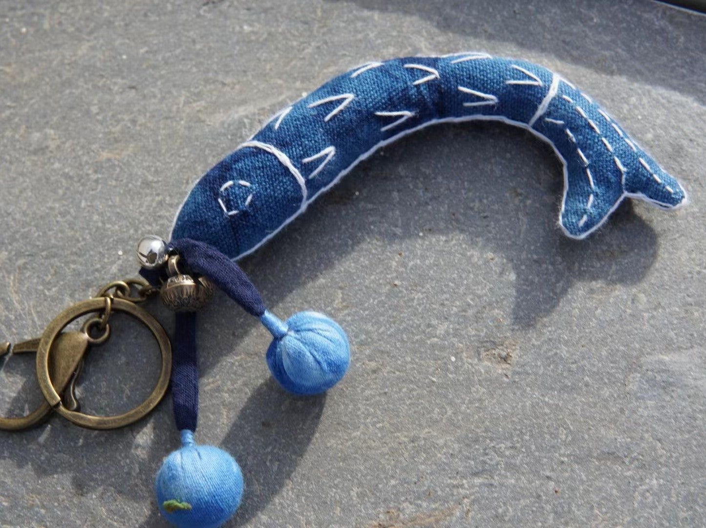 Natural indigo dyed hand-embroidery Lucky Fish key chain. An unique lucky fish bag ornament/ car hanging/ key chain with small bells.