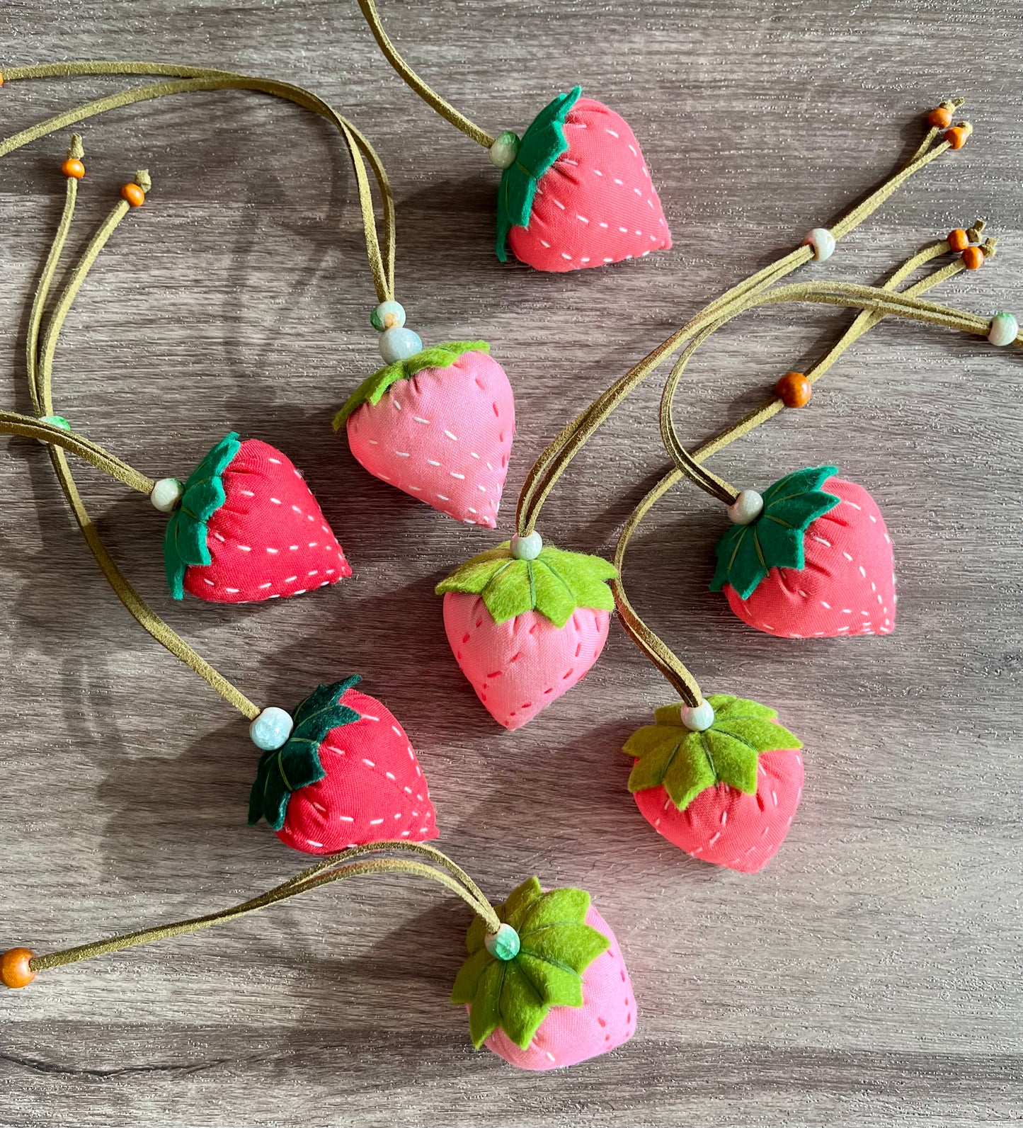Hand-sewing strawberry shaped sachet with lavender scent. Adjustable length strawberry fabric necklace / bag ornament / car sachet.